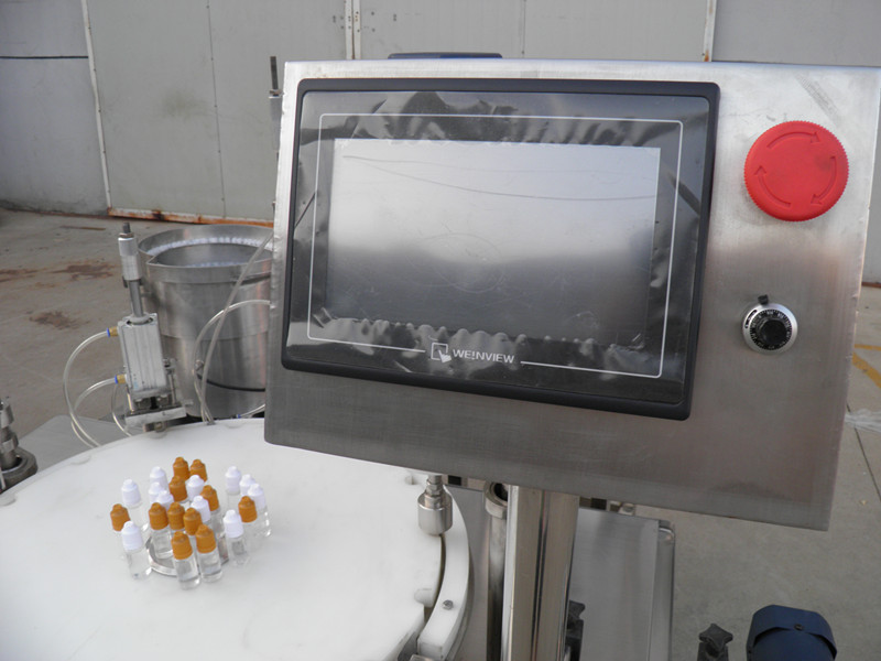 filling plugging capping labeling production line E vedel PLC pudeli täiteava korgi etikett.jpg