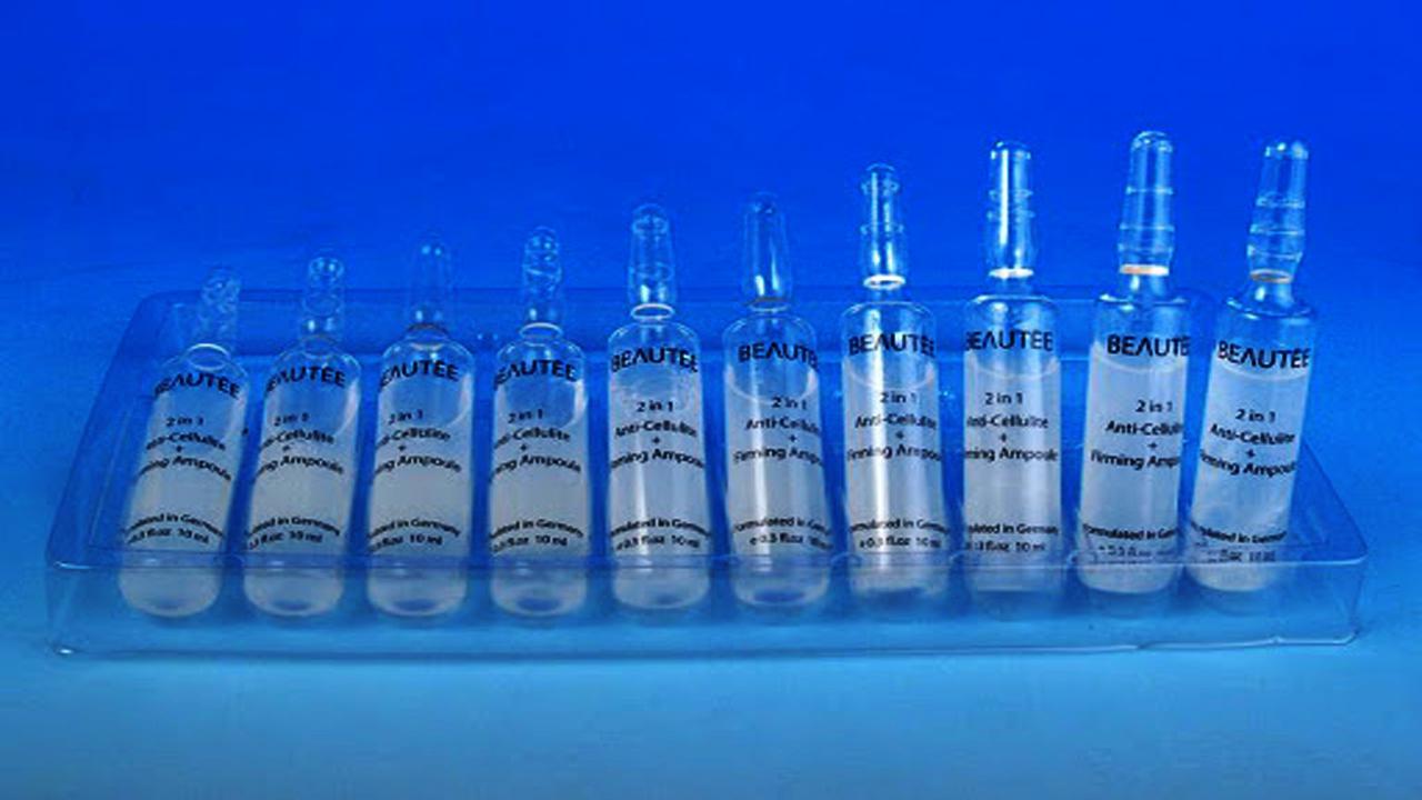 liquid solution bottles labeling machine samples final products ampullpudelid.jpg