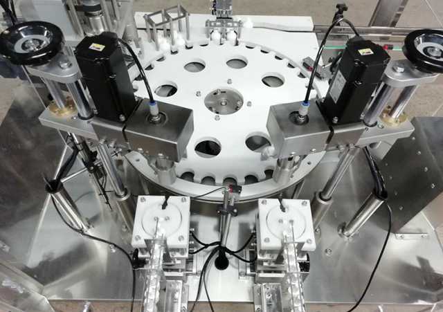 pudelid robot arm feeder.jpg