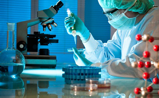 workers testing filling sealing samples laboratoorne-testing-with-tubes-filler-sealer.jpg