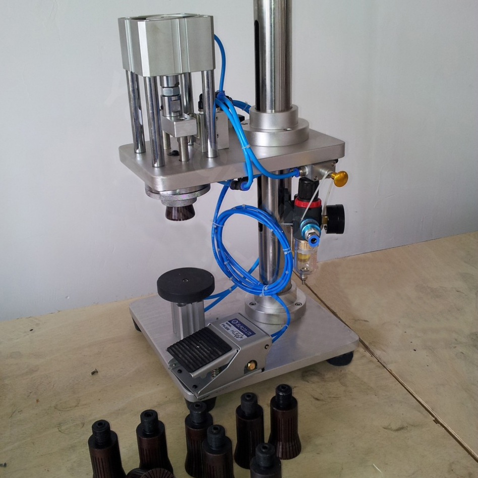 manual crimping machine for glass bottles pneumaatilise korkimise seadmed poolautomaatsed pneumatic.jpg