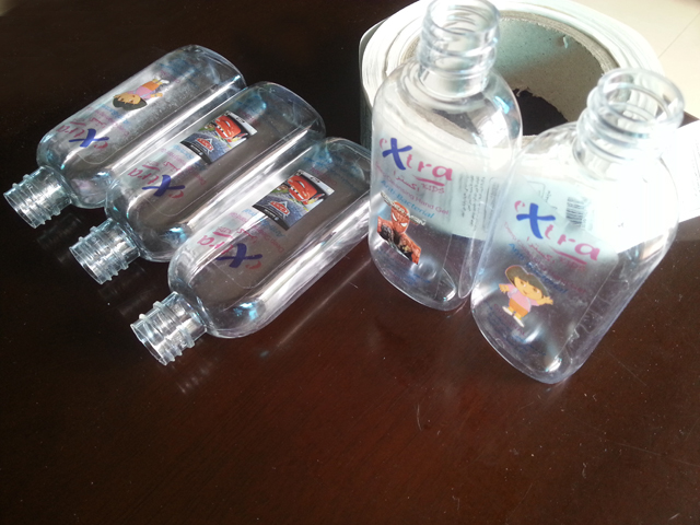 transparent labels labelled samples bottles plane surface Mrwani näidis läbipaistvad etiketid ja pudelid (3).jpg