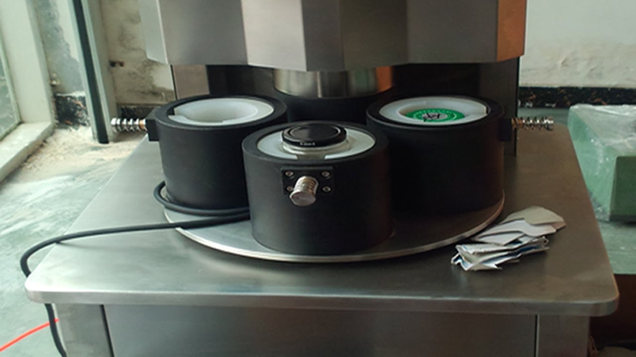 four heads vacuum capping machine semi automatic vaakumkork manual.jpg