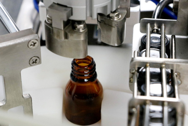 õlipudelite täitmise masin tabletop.jpg